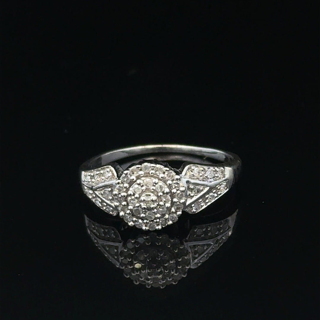 9ct white gold diamond ring in size M, showcasing a sparkling diamond setting and a sleek, elegant design.