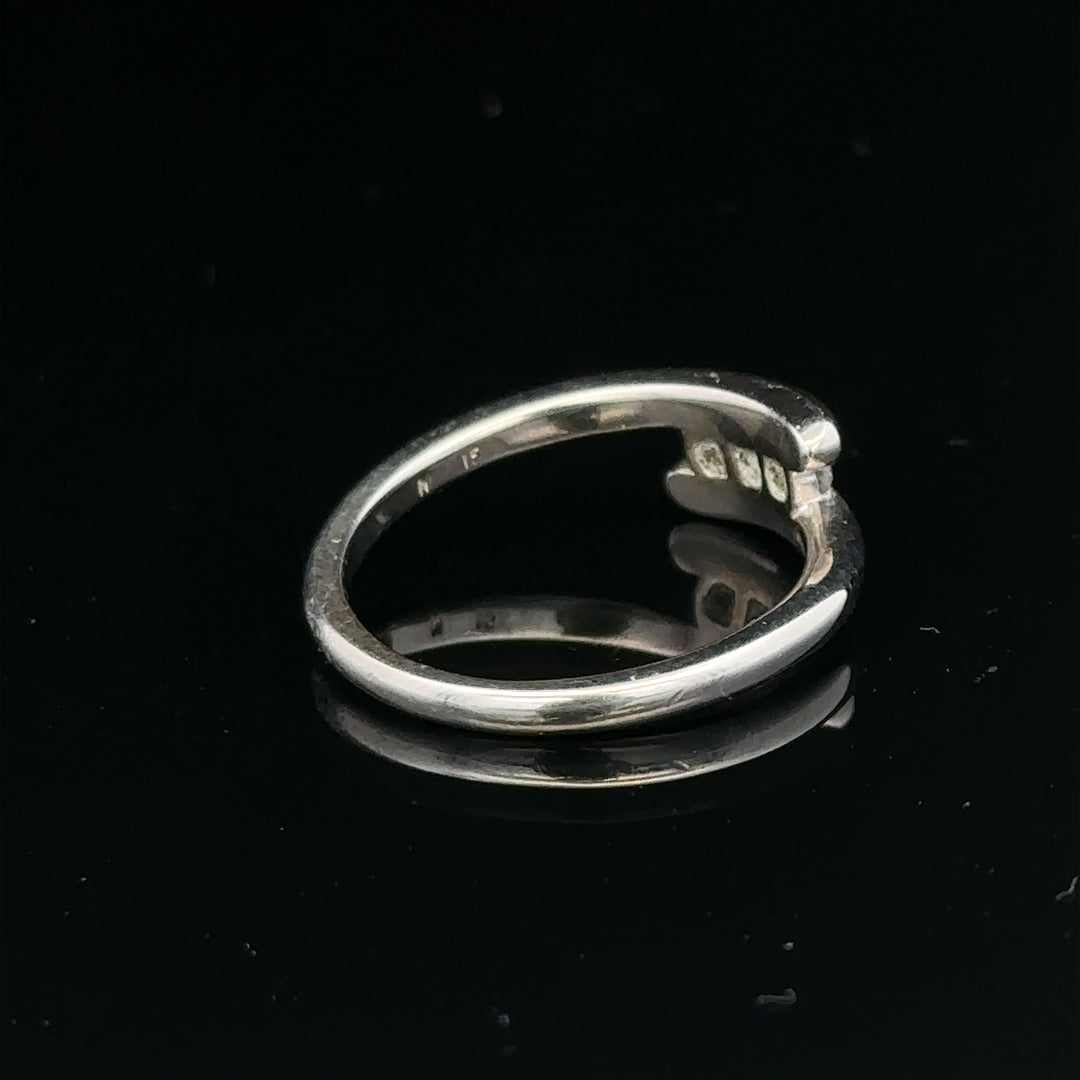 18ct white gold diamond ring in size M.5 with sparkling diamonds, weighing 4.2g, showcasing a elegant and timeless jewelry design.