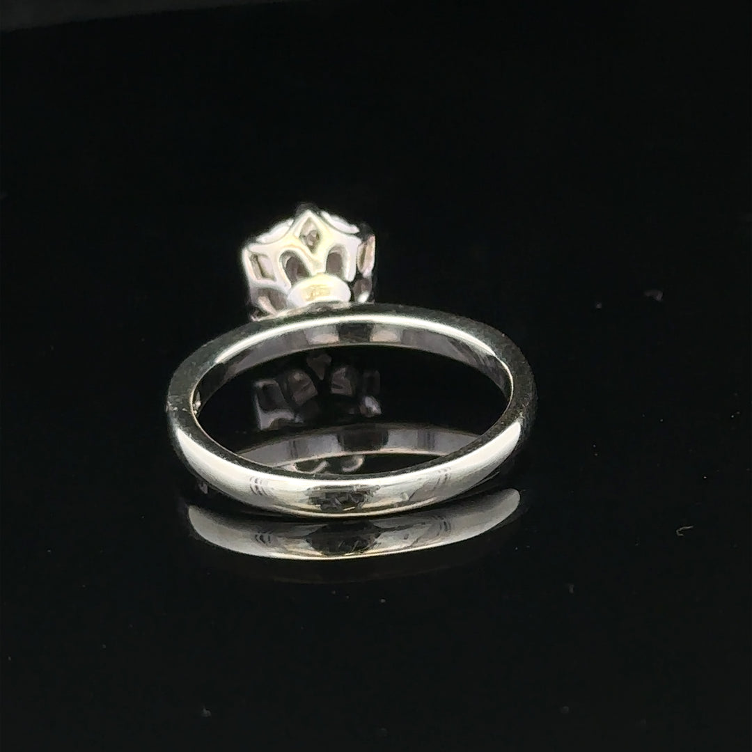 9ct white gold diamond ring in size M, showcasing a sparkling diamond setting and elegant band, weighs 3.2 grams.
