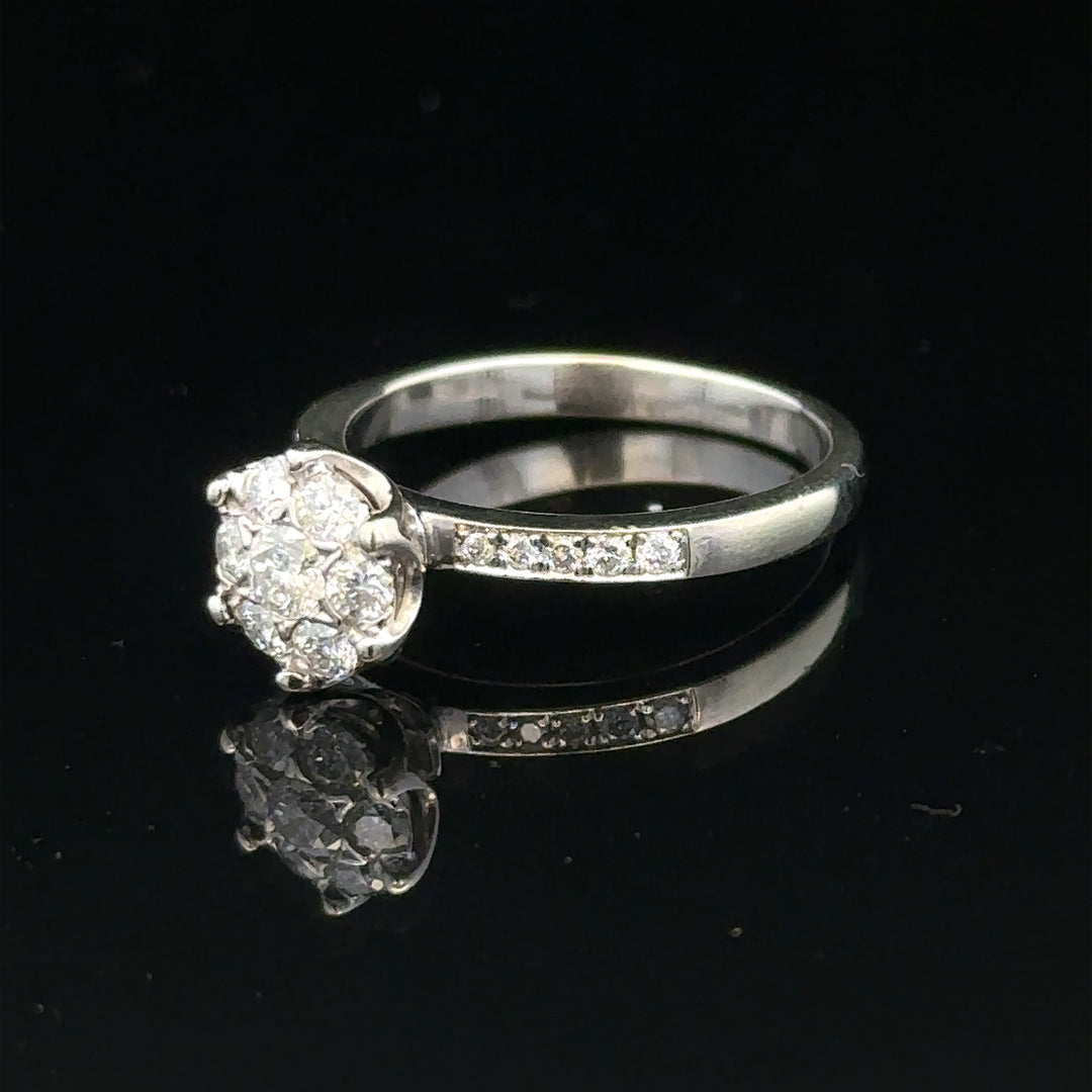 9ct white gold diamond ring in size M, weighing 3.2g, with a detailed view of the sparkling diamond design.