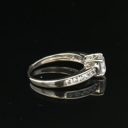 9ct white gold ring in size L 1/2, weighing 2g, displayed on a plain background, showcasing its polished band and simple design.