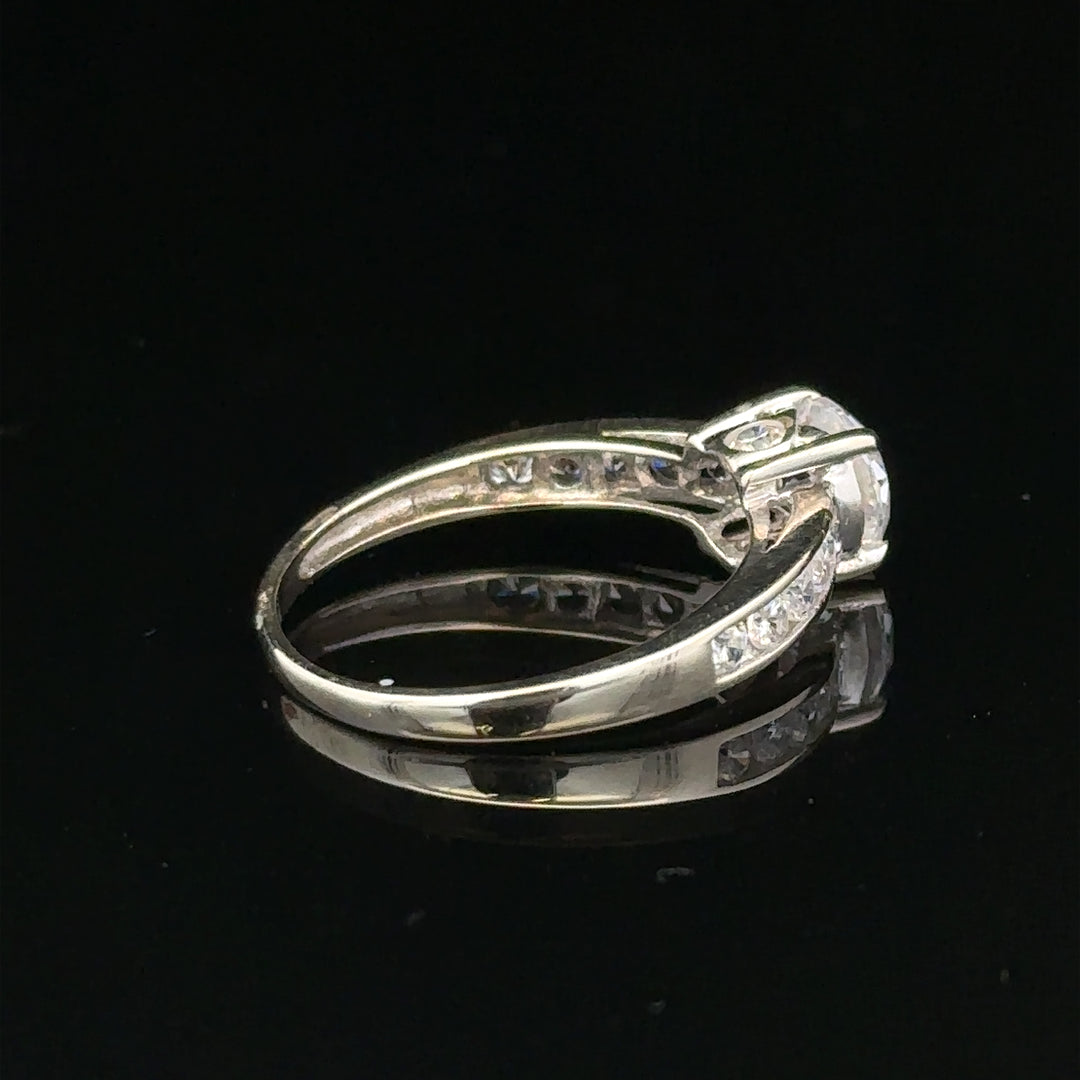 9ct white gold ring in size L 1/2, weighing 2g, showcasing a sleek, polished band with a smooth finish.