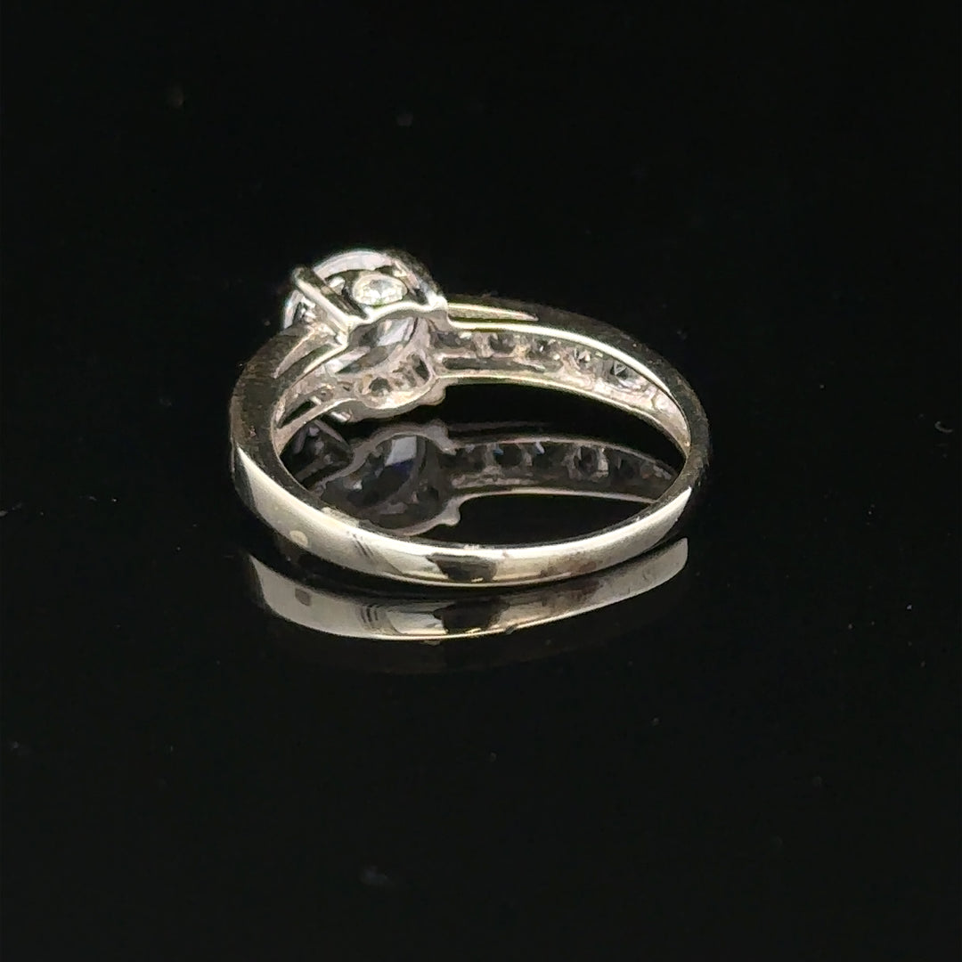 9ct white gold ring in size L 1/2, weighs 2g, featuring a simple, elegant band with no visible gemstones or embellishments.