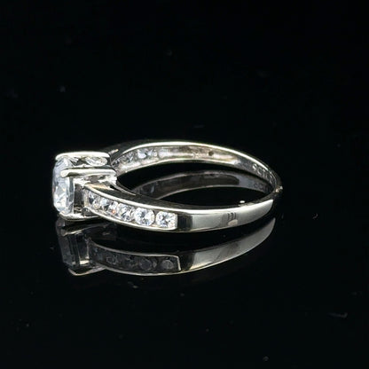 9ct white gold ring in size L 1/2, weighing 2g, unbranded, featuring a smooth polished finish.
