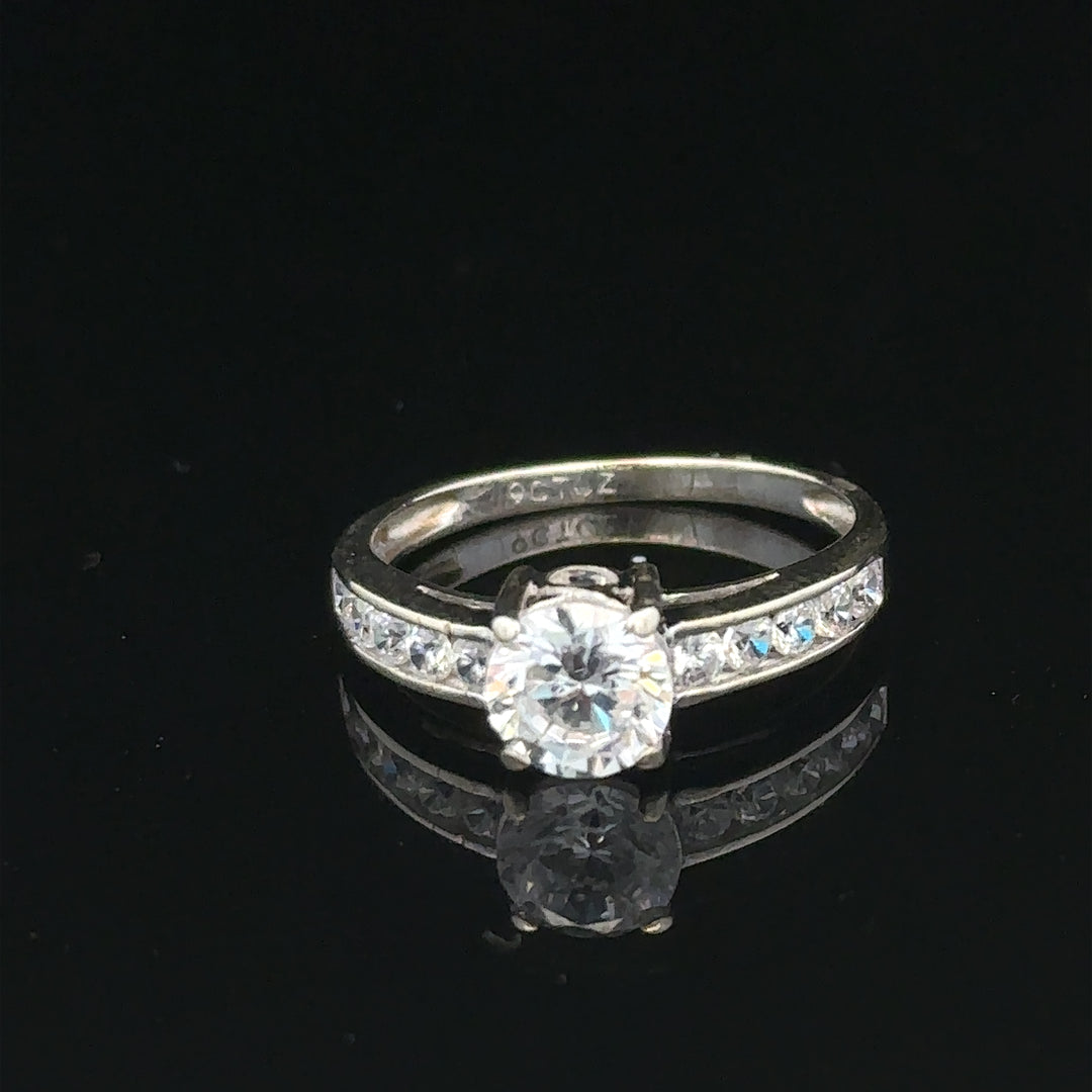 9ct white gold ring in size L 1/2 with a sleek design, weighing 2 grams, unbranded jewelry.