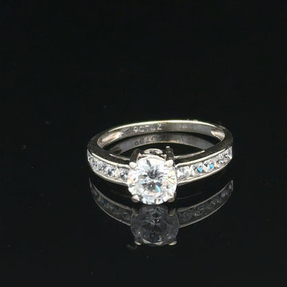 9ct white gold ring in size L 1/2 with a sleek design, weighing 2 grams, unbranded jewelry.