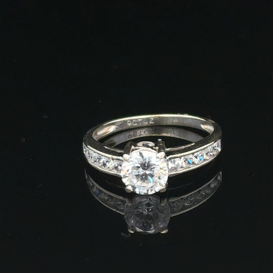 9ct white gold ring in size L 1/2 with a sleek design, weighing 2 grams, unbranded jewelry.