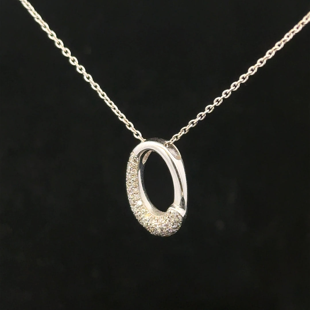 9ct white gold chain with a white gold and diamond pendant, showcasing sparkling jewelry design and fine craftsmanship.