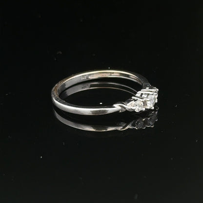 9ct white gold diamond ring in size Q1/2, featuring a sparkling diamond centerpiece and delicate band design.
