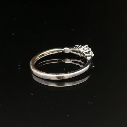 9ct white gold diamond ring size Q1/2 with sparkling diamonds, showcasing intricate design and elegant craftsmanship.