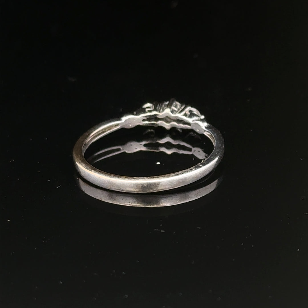 9ct white gold diamond ring size Q1/2 with sparkling diamonds, showcasing an elegant unbranded jewelry design.