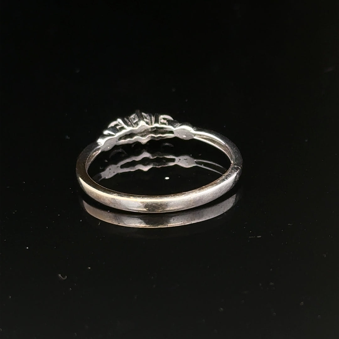 9ct white gold diamond ring size Q1/2, elegant jewelry with sparkling diamonds and polished band, unbranded design.