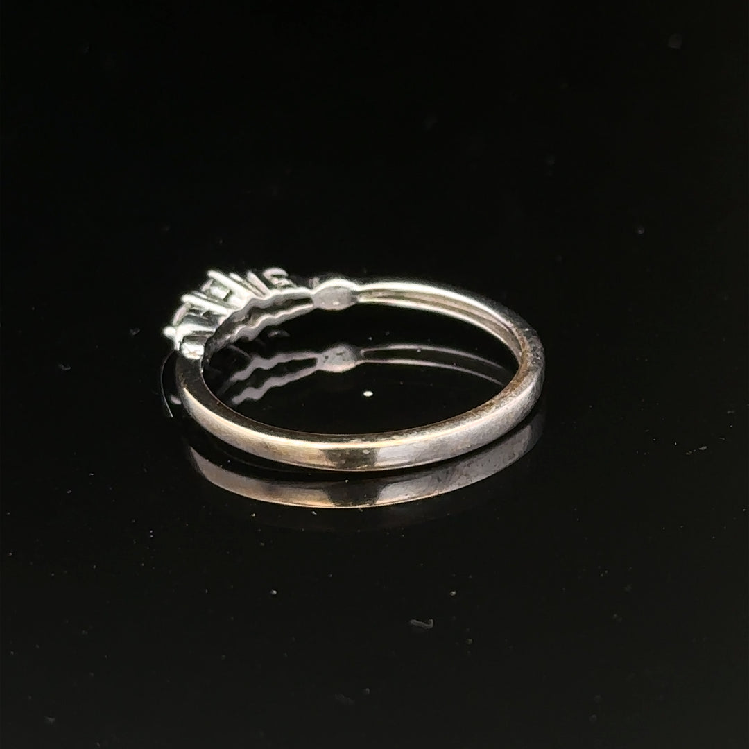 9ct white gold diamond ring size Q1/2 with sparkling diamonds, showcasing a elegant jewelry design.