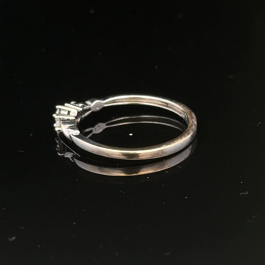 9ct white gold diamond ring in size Q1/2 with sparkling diamonds, showcasing an elegant jewelry design.