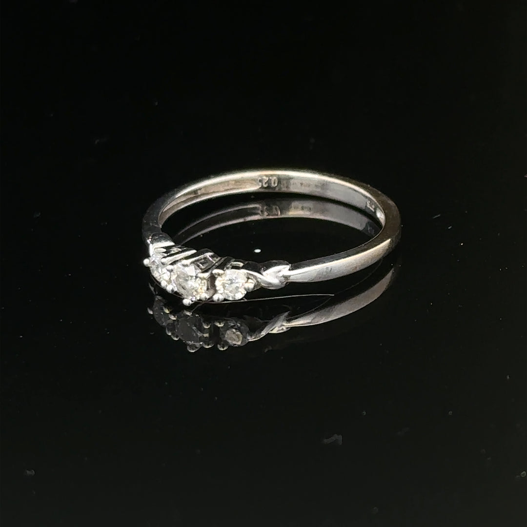 9ct white gold diamond ring in size Q1/2 with sparkling diamonds, showcasing elegant jewelry design.