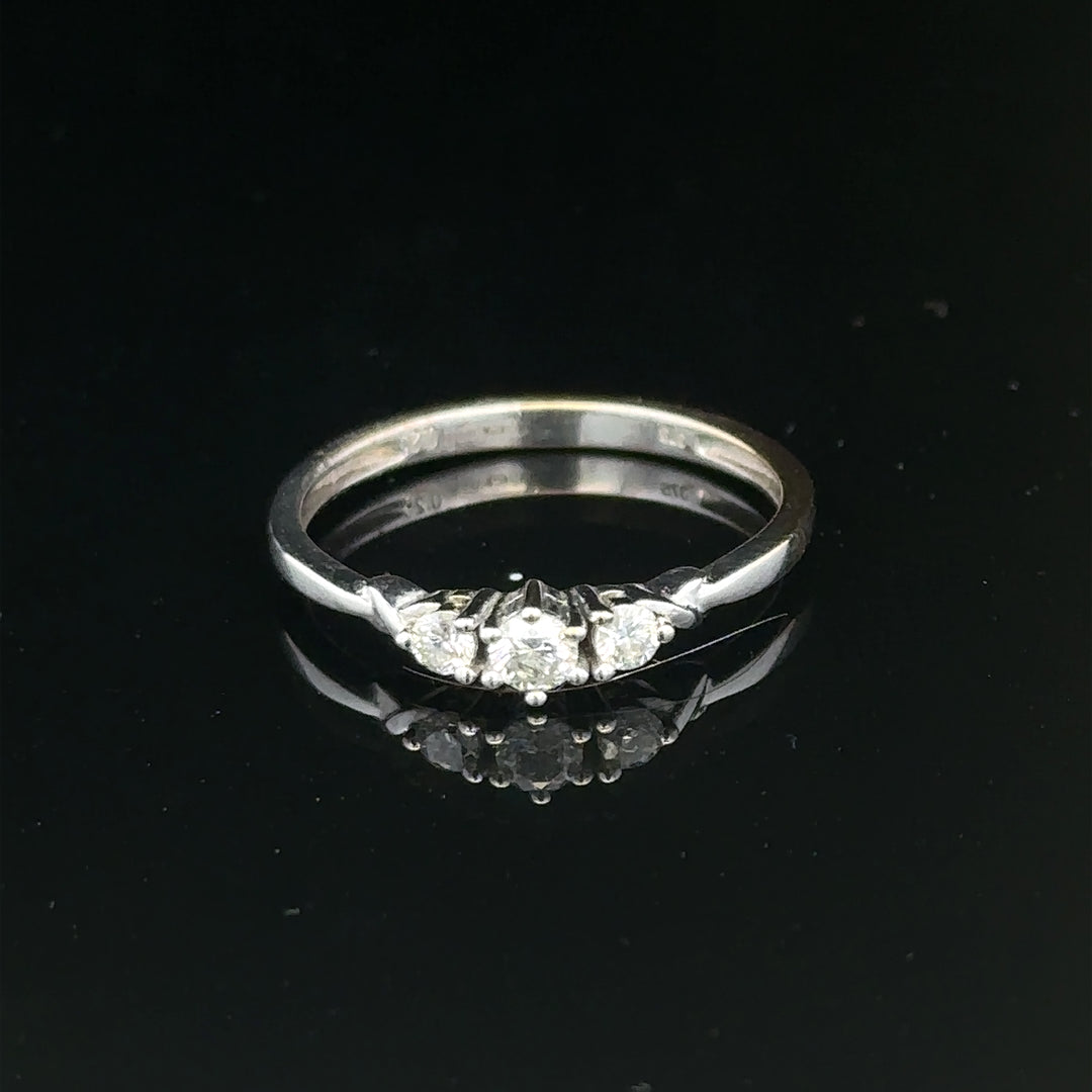 9ct white gold diamond ring in size Q1/2 with sparkling diamonds, showcasing elegant jewelry craftsmanship.