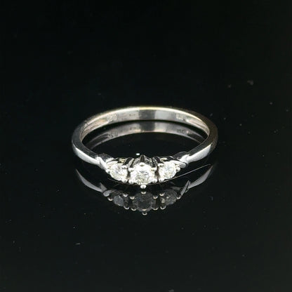 9ct white gold diamond ring in size Q1/2 with sparkling diamonds, showcasing elegant jewelry craftsmanship.