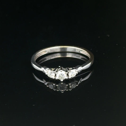 9ct white gold diamond ring in size Q1/2 with sparkling diamonds, showcasing elegant jewelry craftsmanship.