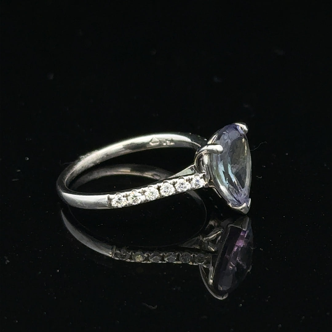 18ct white gold diamond ring in size L1/2 with sparkling diamonds, showcasing a delicate and elegant jewelry design.