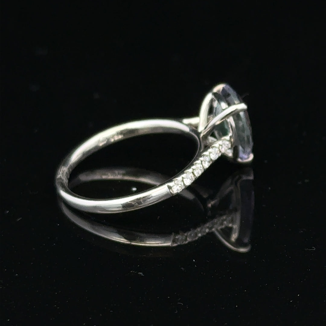 18ct white gold diamond ring size L1/2, unbranded, showcasing a sparkling diamond set in a sleek band.