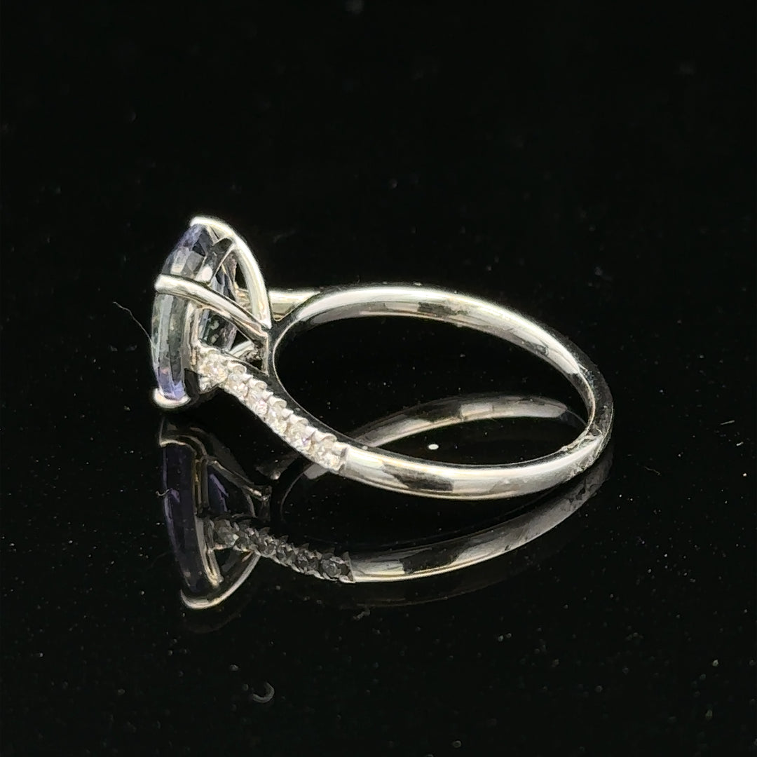 18ct white gold diamond ring size L1/2 with sparkling diamonds, showcasing elegant jewelry design.
