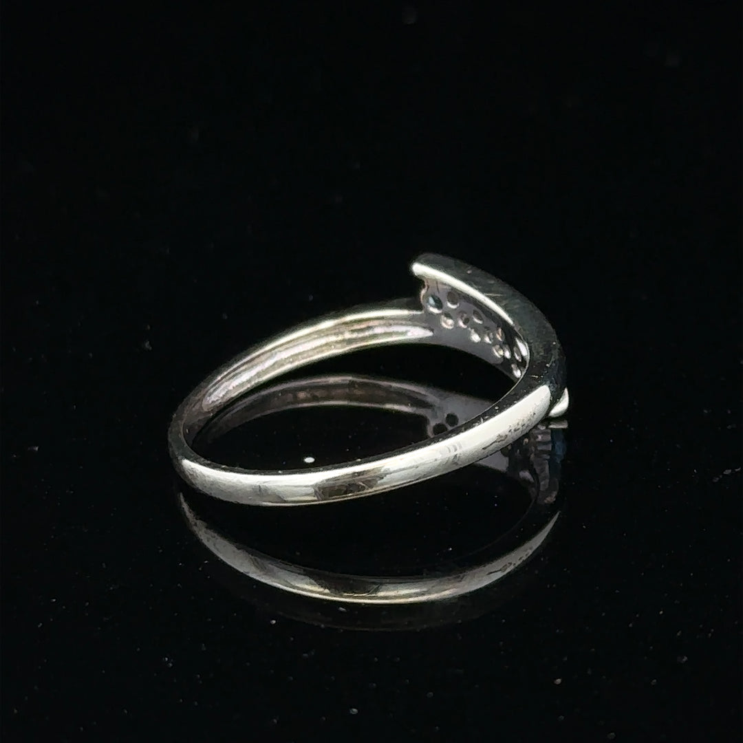 9ct white gold diamond ring in size N1/2 with sparkling diamonds, showcasing elegant jewelry craftsmanship.