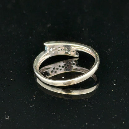 9ct white gold diamond ring size N1/2 with sparkling diamonds, close-up view showing the elegant design and polished band