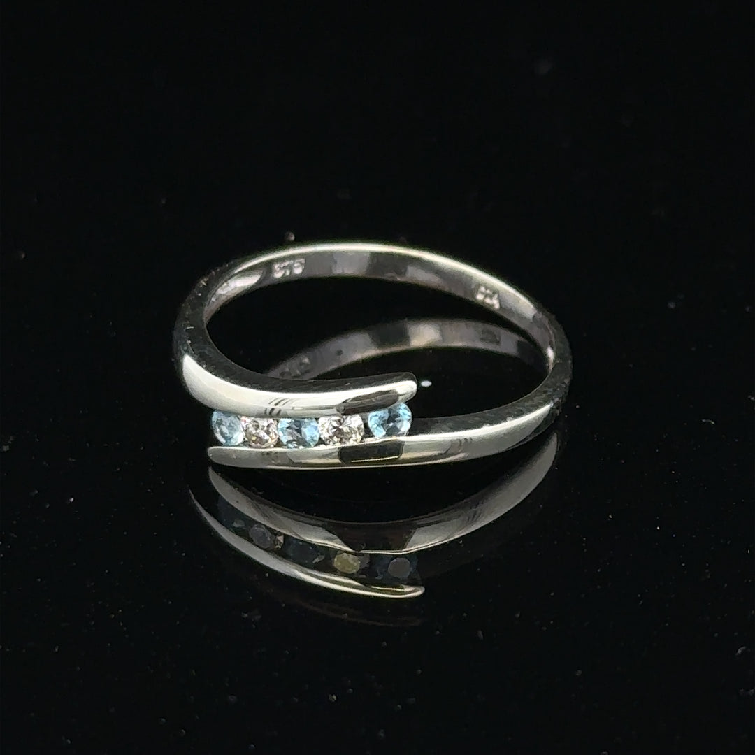 9ct white gold diamond ring size N1/2 with sparkling diamonds, close-up view showing intricate band design.