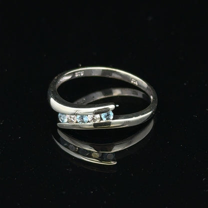 9ct white gold diamond ring size N1/2 with sparkling diamonds, close-up view showing intricate band design.