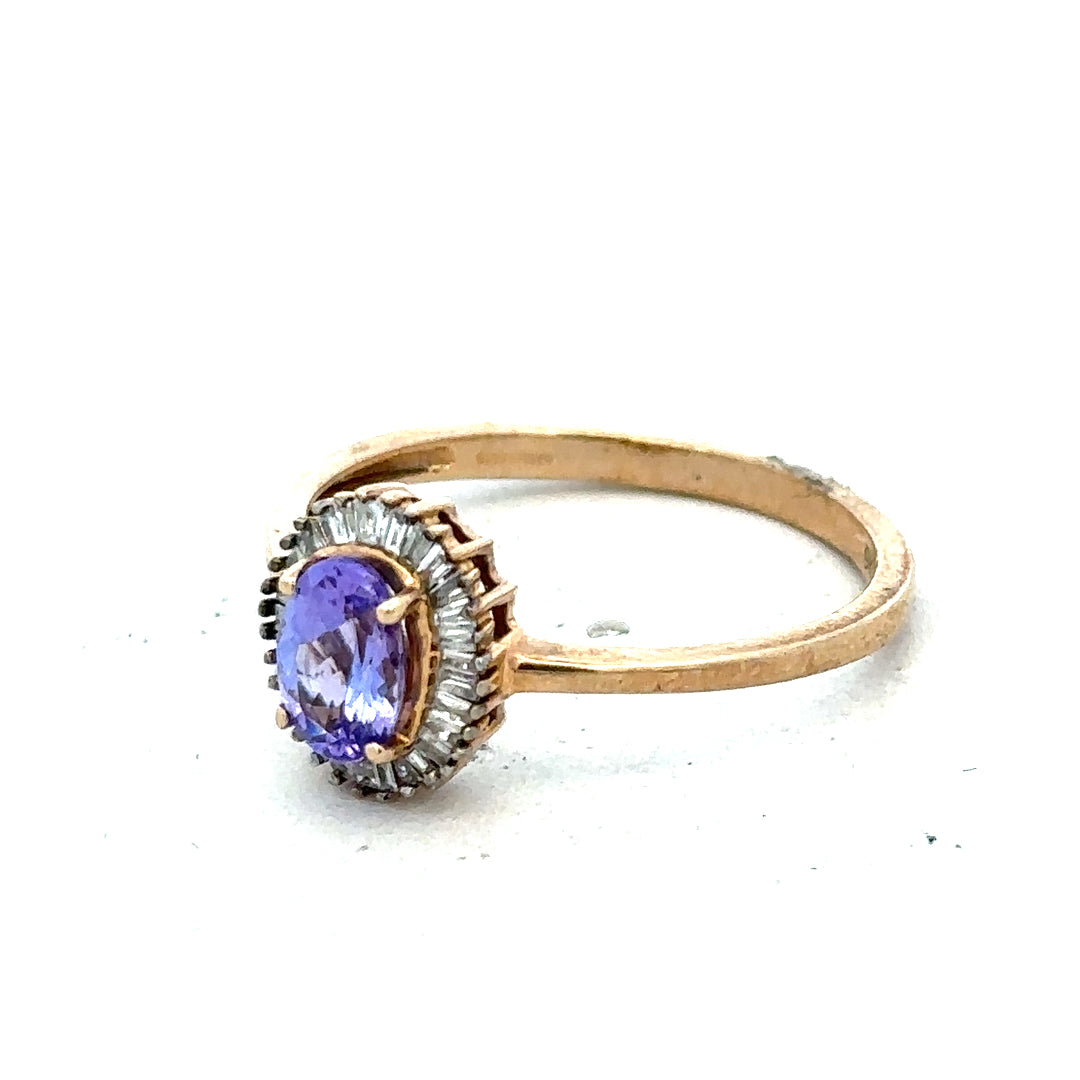 9ct yellow gold diamond ring size T with sparkling diamonds, showcasing elegant jewelry design on a neutral background.