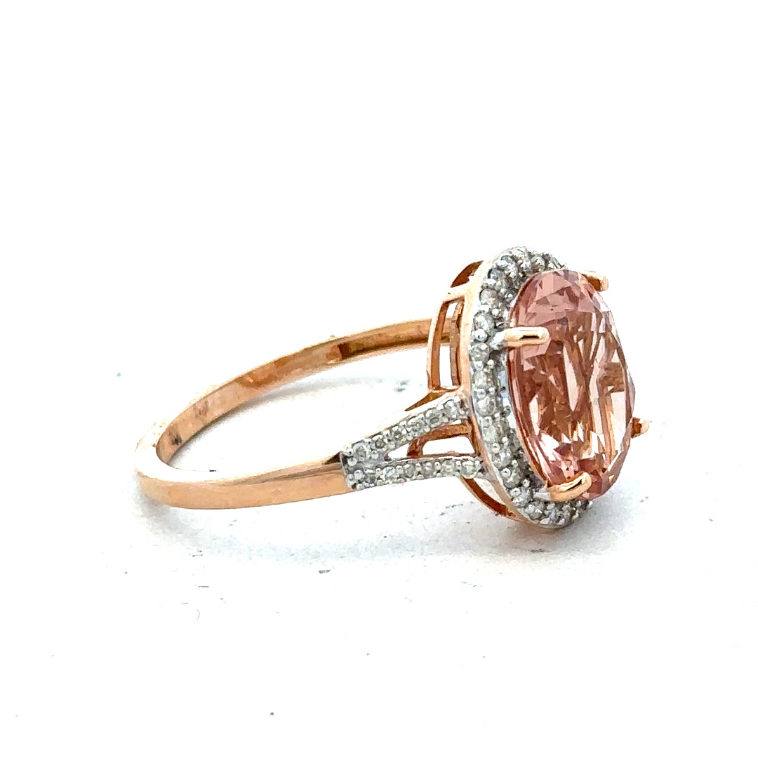 14ct gold Morganite and diamond ring in size S, featuring a delicate design with sparkling gemstones.