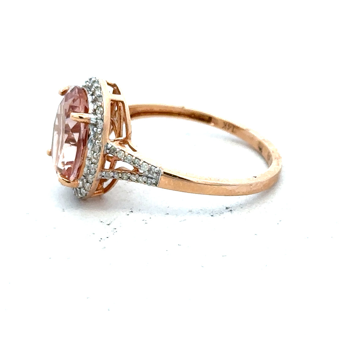 14ct gold Morganite and diamond ring in size S, featuring a delicate band with sparkling gemstones.