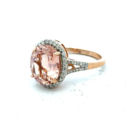 14ct gold Morganite and diamond ring in size S, showcasing the elegant gemstone and sparkling accents on a delicate band.