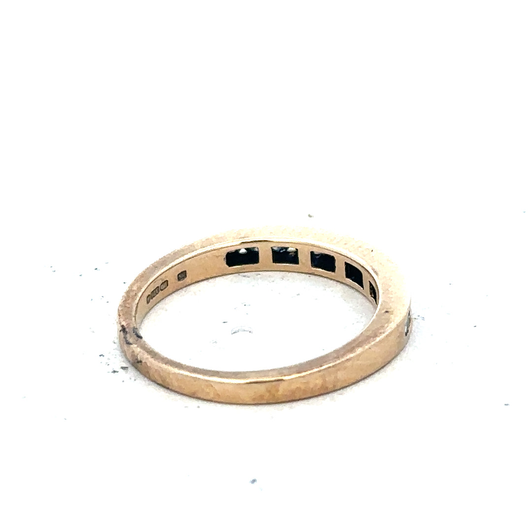 9ct yellow gold diamond ring with 1/4 carat total weight, size J1/2, featuring a central diamond and elegant band design.