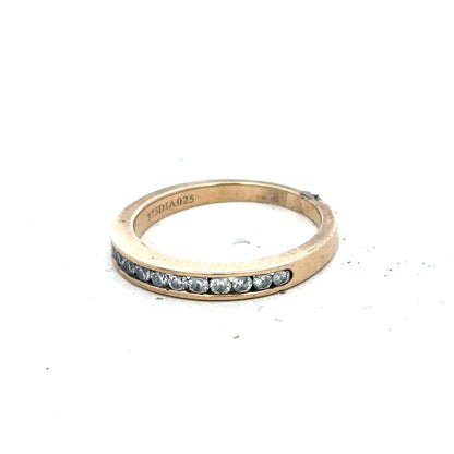 9ct yellow gold diamond ring with 1/4 carat total weight, size J1/2, featuring sparkling diamonds on a sleek band.