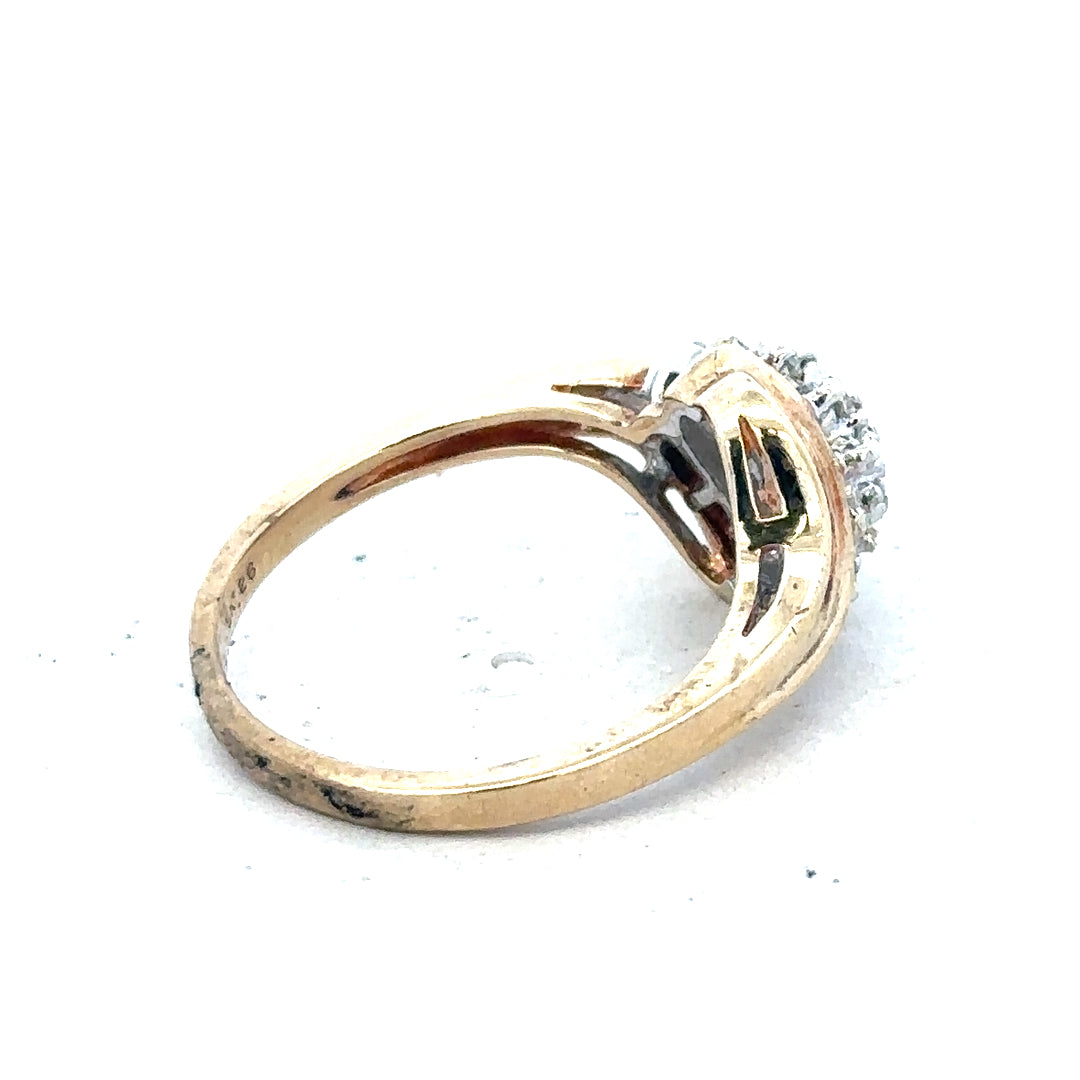 9ct yellow gold diamond ring with 0.26 carats, size P, featuring a simple, elegant design and a sparkling diamond centerpiece.