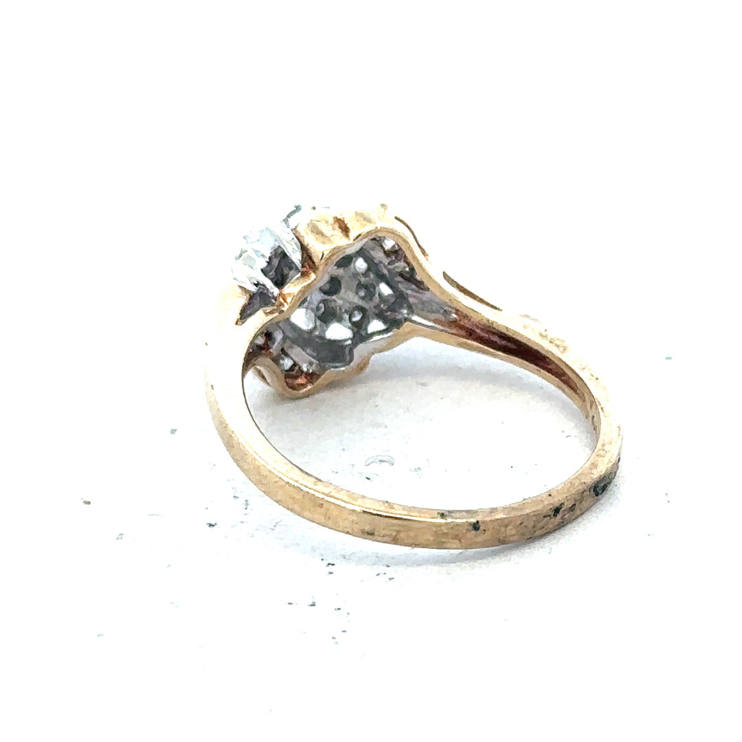 9ct yellow gold diamond ring with 0.26 carats, size P, featuring a simple band with a central diamond setting.