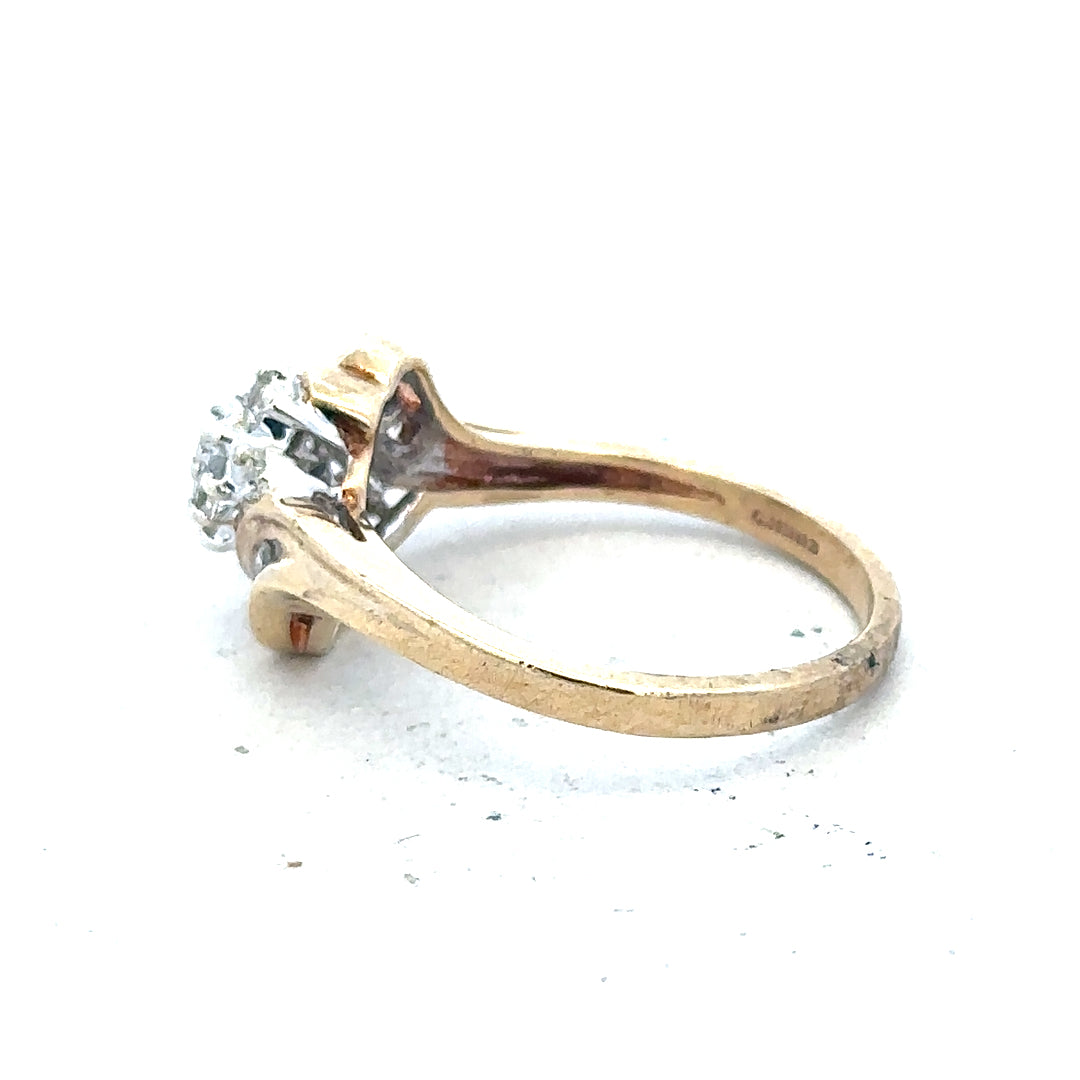9ct yellow gold diamond ring with 0.26 carat pear-shaped diamond, size P, featuring a simple elegant design.
