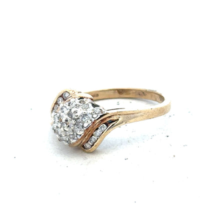 Yellow gold diamond ring with 0.26 carats, size P, featuring a simple band design and sparkling diamonds.
