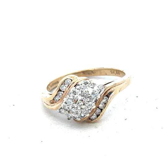 9ct yellow gold diamond ring with 0.26 carats, size P, featuring a sparkling central diamond on a polished band.