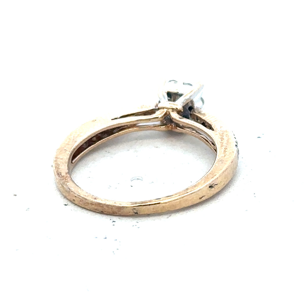 9ct yellow gold diamond ring in size P with sparkling gemstones, showcasing elegant craftsmanship and timeless style.