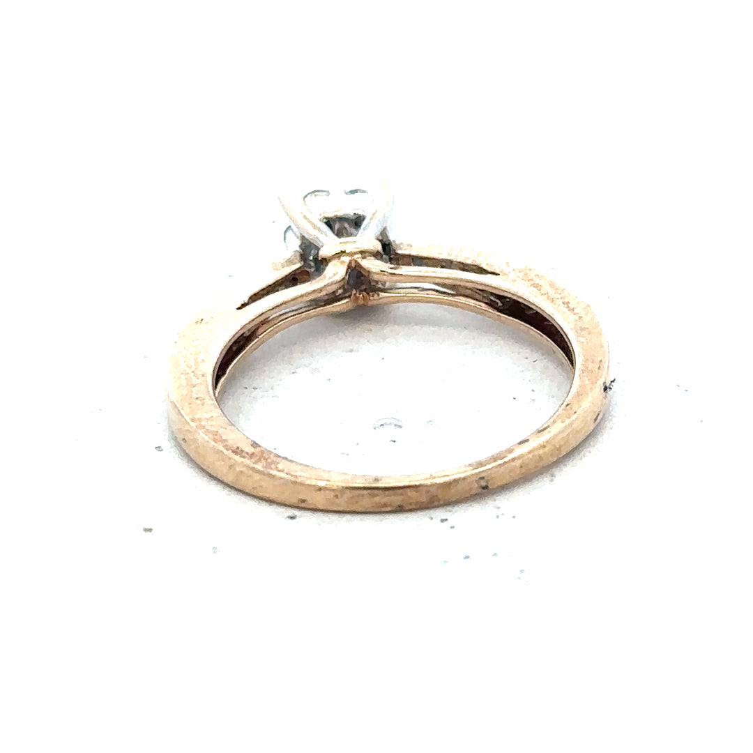 9ct yellow gold diamond ring in size P with sparkling diamonds, showcasing elegant craftsmanship and classic jewelry design.
