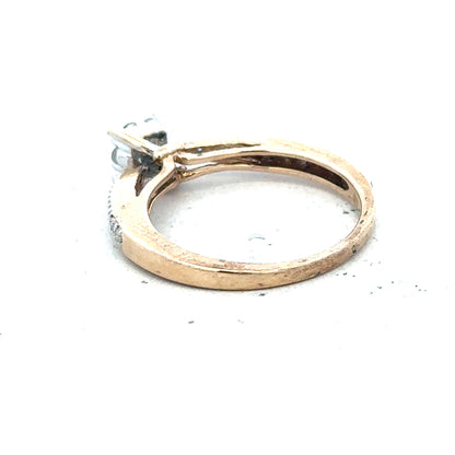 9ct yellow gold diamond ring in size P with sparkling diamonds, showcasing elegant jewelry craftsmanship.