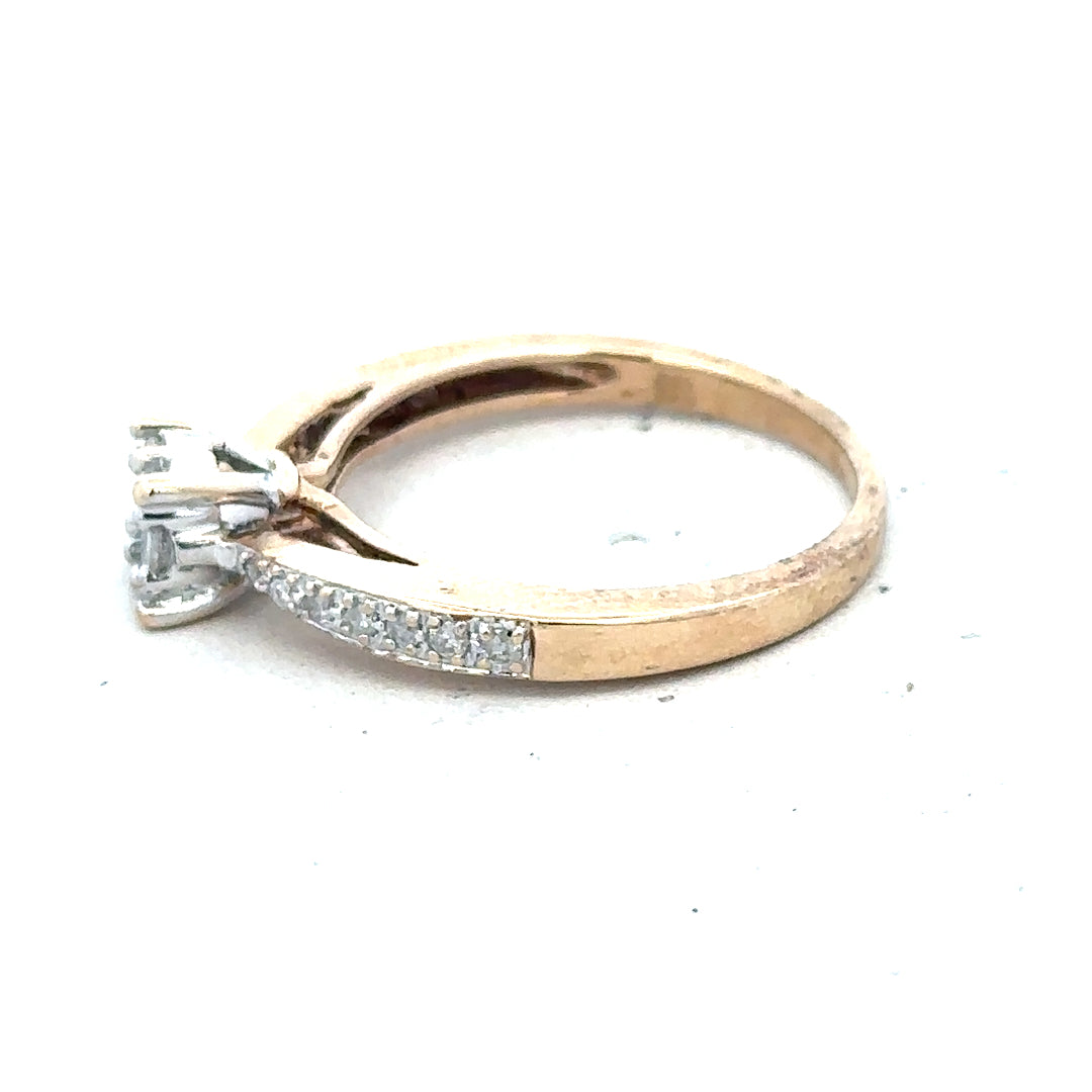 9ct yellow gold diamond ring in size P with sparkling diamonds, showcasing elegant craftsmanship and a polished finish.