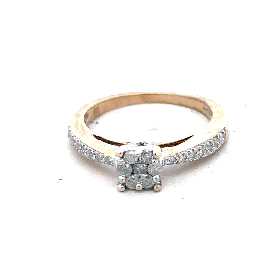 9ct yellow gold diamond ring in size P with sparkling diamonds, showcasing elegant jewelry design and craftsmanship.