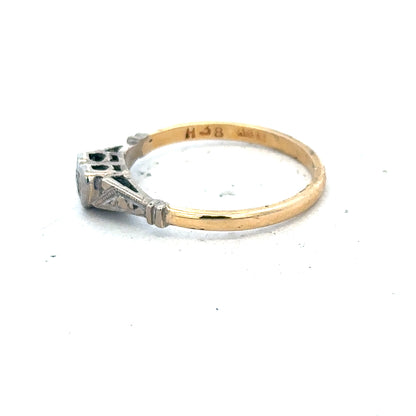 18ct yellow gold diamond ring size N with sparkling diamonds, unbranded jewelry piece displayed on a neutral background.