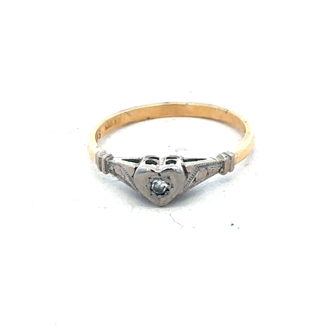 18ct yellow gold diamond ring in size N, showcasing sparkling diamonds set in a classic gold band.