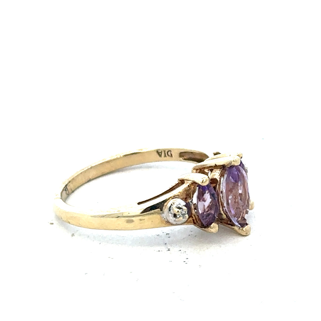9ct yellow gold amethyst and diamond ring, size P, featuring a central purple amethyst gemstone with diamond accents.