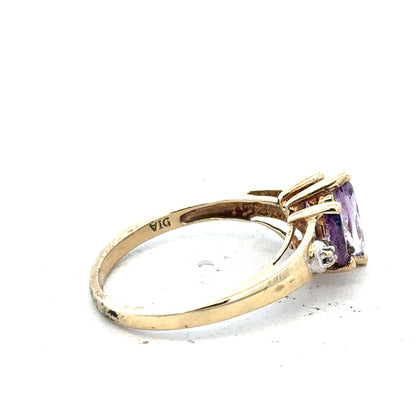 9ct yellow gold amethyst and diamond ring, size P, featuring a central purple gemstone with sparkling diamond accents.