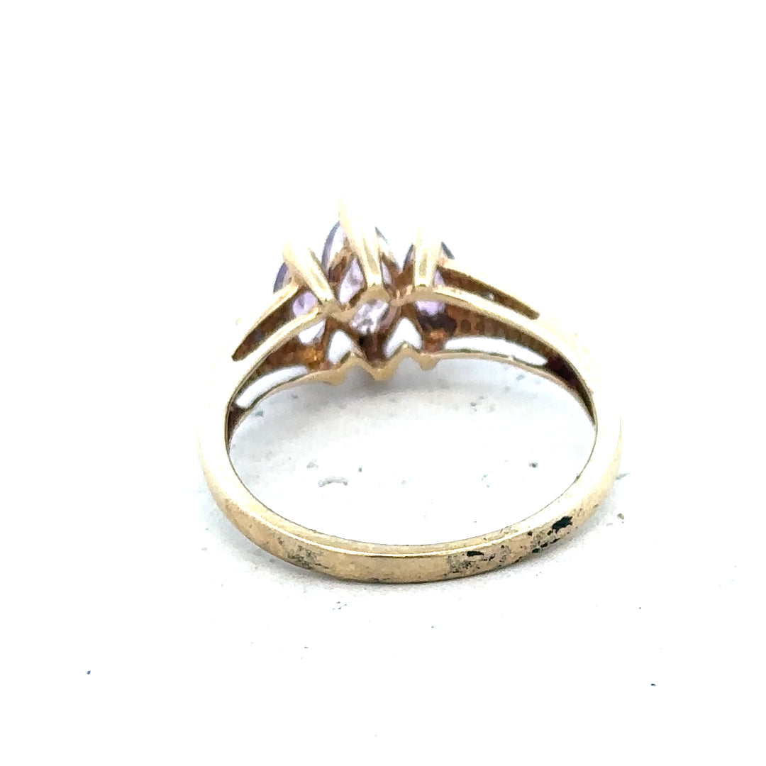 9ct yellow gold amethyst and diamond ring, size P, featuring a central purple gemstone and sparkling accents.